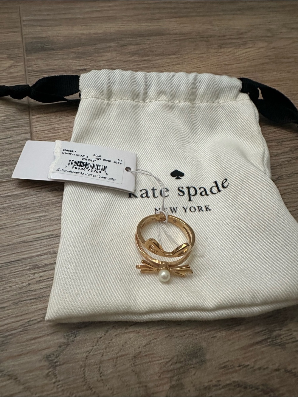 kate spade gold-tone bow ring with pearl detail